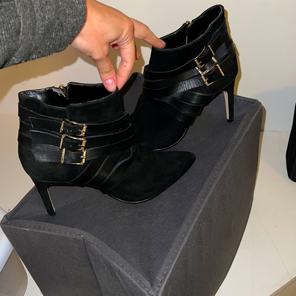 BCBG black heeled booties with buckle design